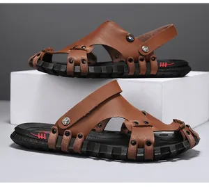Close-up of brown leather men's sandals with dual-purpose heel strap and black sole