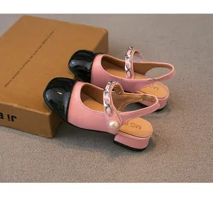 Elegant pink and black two-tone girls' dress sandals with pearl and chain detail