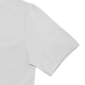 Detail of a white men's short sleeve T-shirt showing sleeve cuff and shoulder seam.