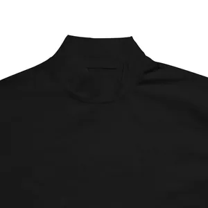 Close-up detail of a men's black mock neck tight-fit T-shirt showing collar stitching.
