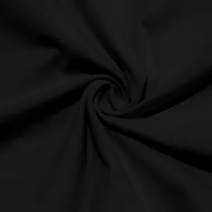 Close-up macro view of soft black knitted fabric texture for men's slim fit T-shirt