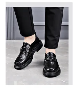 Detailed view of black breathable hollow-out leather business loafers for men fashion