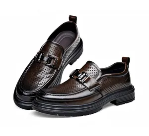 Close-up view of breathable perforated brown leather loafers featuring black metal buckle