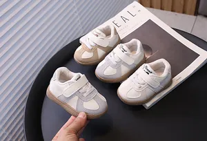 Stylish toddler walking shoes for boys and girls in soft blue and khaki colors.
