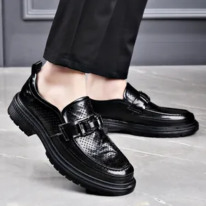 Breathable black perforated leather loafers for men with metal buckle and slip-on design