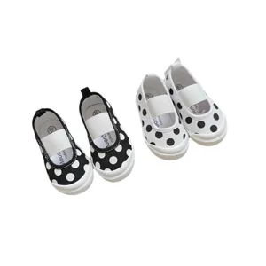 Korean style polka dot canvas toddler shoes for girls with soft soles and elastic bands.