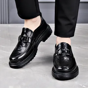 Breathable black leather loafers for men with stylish perforated design and buckle detail