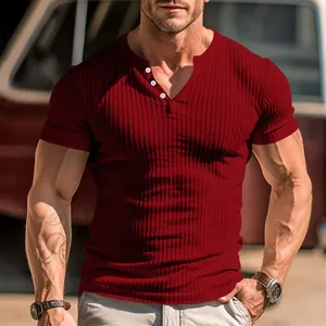 Detailed view of men's slim-fit ribbed Henley shirt in dark red with button neckline