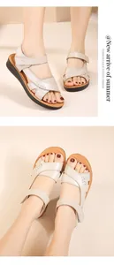 Comfortable leather sandals for elderly women featuring soft straps and Velcro closure