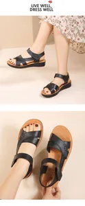 Macro view of black leather sandals for women with soft crisscross straps design