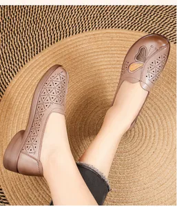 Comfortable brown leather loafers with butterfly embroidery and hollow-out detail