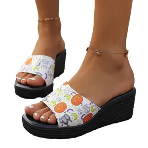 Stylish Halloween themed platform wedge sandals with pumpkin and ghost print details