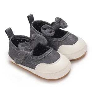 Grey denim baby walking shoes with bow detail and soft sole