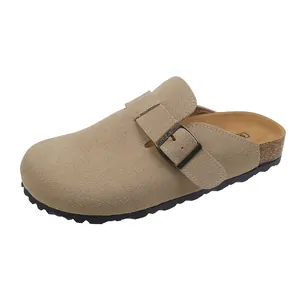 Detail view of khaki suede mule with adjustable bronze buckle and cork sole