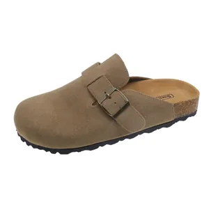 Comfortable brown suede clog slippers with adjustable buckle strap and cork sole design