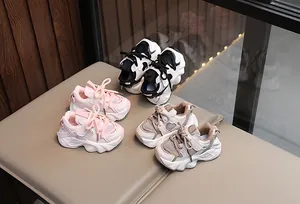 Detailed view of breathable mesh children sneakers in three stylish color options