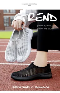 Detail of breathable hollow mesh slip-on sneakers for women on a running track
