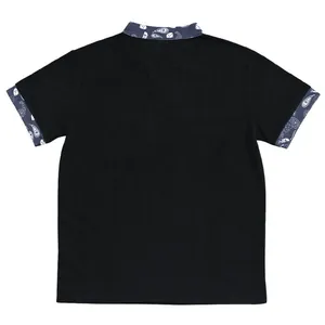 Back view of men's black corduroy Henley shirt with blue paisley collar and cuffs