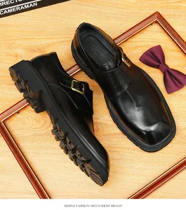 Detailed view of elegant black leather monk strap shoes with a durable thick lug sole