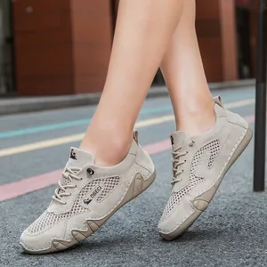 Zapatillas casuales de malla transpirable para hombres y mujeres en color beige