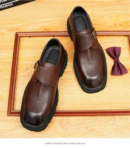 Detailed top view of brown leather monk strap shoes for men with formal bow tie