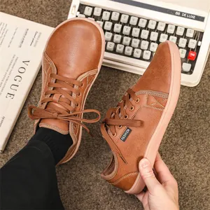 Men's brown leather barefoot shoes featuring broad toe design and lightweight soft sole