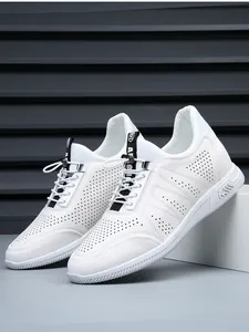 Detailed side view of men's white perforated leather sneakers with hidden heightening soles