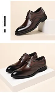 Premium brown leather business dress shoes for men featuring elegant brogue wingtip details