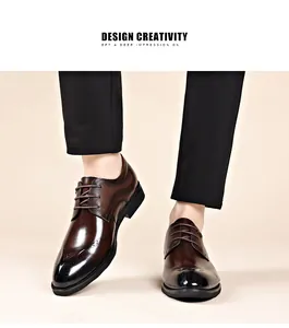 A detailed close-up of brown genuine leather business formal shoes for men on feet