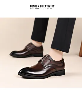 Detail view of brown leather formal oxfords shoes with gradient black toe and brogue accents.