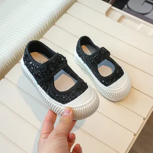 Sparkly black sequin girls' Mary Jane canvas sneakers with easy hook and loop strap