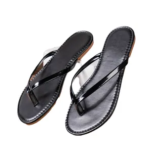 Classic black women's flip-flop sandals with glossy straps and comfortable flat sole.