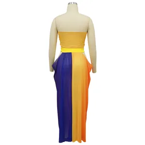Back view of a beach style two-piece set with a yellow tube top and colorful skirt