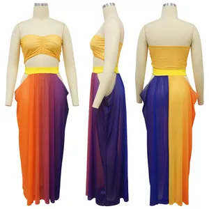 Women's beach fashion set featuring yellow tube top and vibrant multi-color mesh maxi skirt