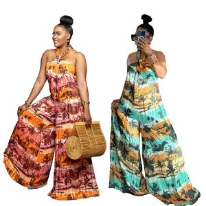 Tropical palm print halter neck backless wide leg jumpsuit in orange and teal colors