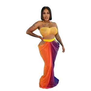 Detailed view of the vibrant gradient print beach set featuring a bandeau top and maxi skirt