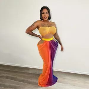 Vibrant two-piece beach set featuring a tube top and a colorful gradient long skirt
