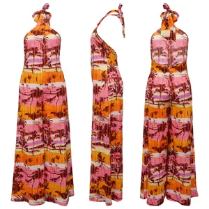 Front, side and back views of a tropical palm tree print halter backless jumpsuit