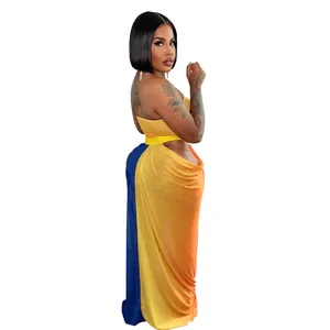 Side view of woman in vibrant yellow blue orange gradient beach style two-piece set