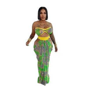 Detailed view of women's green chain print two-piece set with tube top and maxi skirt