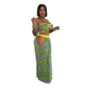 Chic beach style two-piece set featuring bandeau top and printed maxi skirt in green