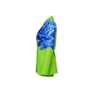 Side view of lime green women's shawl collar blazer and shorts set with floral print