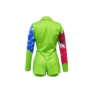Back view of neon green women blazer and shorts set with floral printed sleeves.