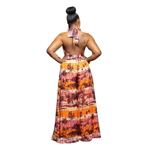 Back view of a tropical palm tree print halter neck backless jumpsuit for women