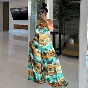 Tropical coconut tree print halter neck backless wide leg jumpsuit detail view