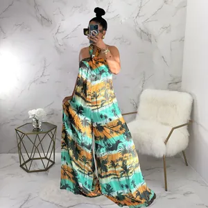 Stylish women's tropical palm tree print halter neck backless loose casual wide leg jumpsuit