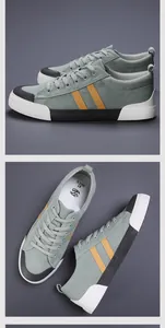 Vue détaillée des baskets en toile pour hommes vert sauge avec des rayures jaunes