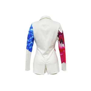 Back view of a stylish white blazer and shorts set featuring floral print sleeves