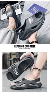 Detail view of grey breathable men's sandals with stylish side cutouts and letter print.