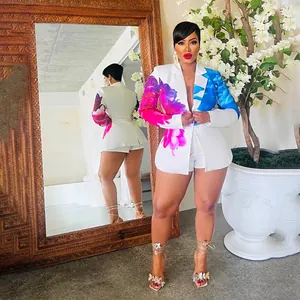 Full view of women's floral suit set showing front and back mirrored details